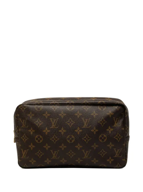 Louis Vuitton Pre-Owned 1987 Monogram Trousse Toilette 28 clutch bag Brown Y247CKEKAP3KJTMA