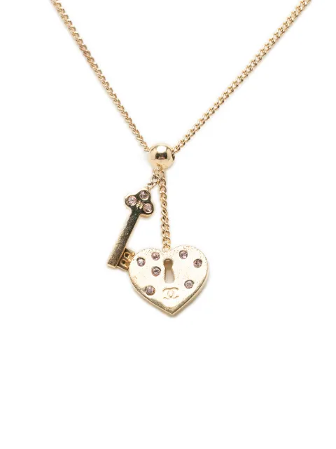 CHANEL Pre-Owned 2002 CC Gold Plated Strass Heart Lock And Key Pendant Necklace costume necklace Gold XJMYXDB81MTZVSOK