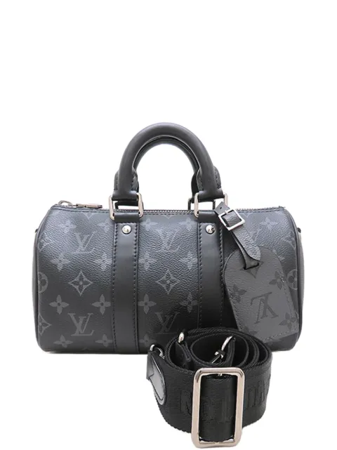 Louis Vuitton Pre-Owned 2021-2026 Monogram Eclipse Reverse Keepall Bandouliere 25 satchel Black WB0M3XOD9TDXE5Y0