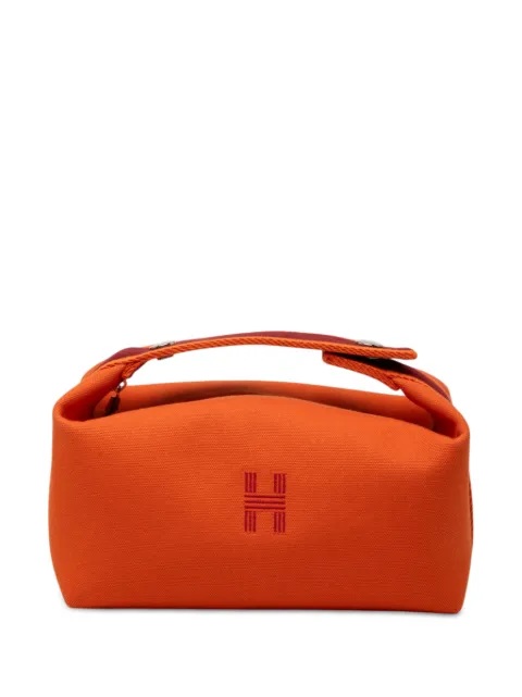 Hermès Pre-Owned 2012-2026 Small Toile Bride A Brac Case vanity bag Orange J7MAOFY0ZY77QUHD