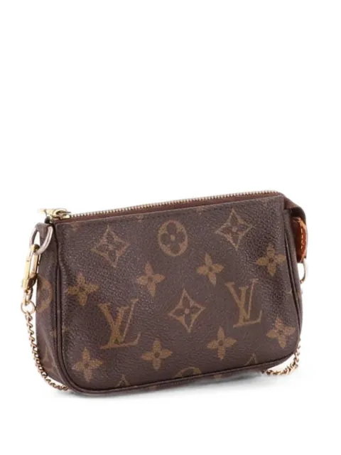 Louis Vuitton Pre-Owned Pochette Accessoires Monogram Canvas Mini clutch bag Brown 79A4M240AJN4T7H3