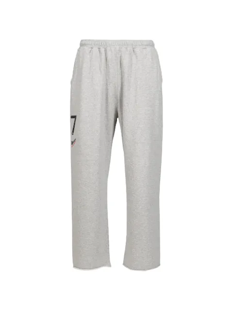 PROTOTYPES logo-print raw-cut track pants Grey 33PT06JE06USGGRY