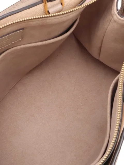 Louis Vuitton Pre-Owned 2021-2026 Bicolor Monogram Empreinte Giant Petit Palais satchel Brown 0C9VN5IIJN1KL9PM
