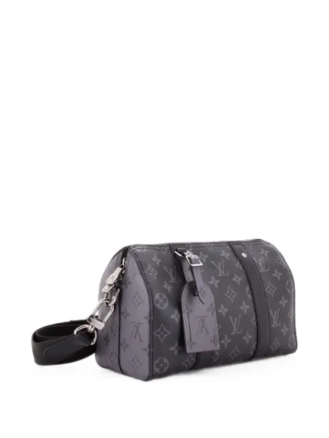 Louis Vuitton Pre-Owned City Keepall Bag Reverse Monogram Eclipse Canvas crossbody bag Black QXCWTI2XV10JE844