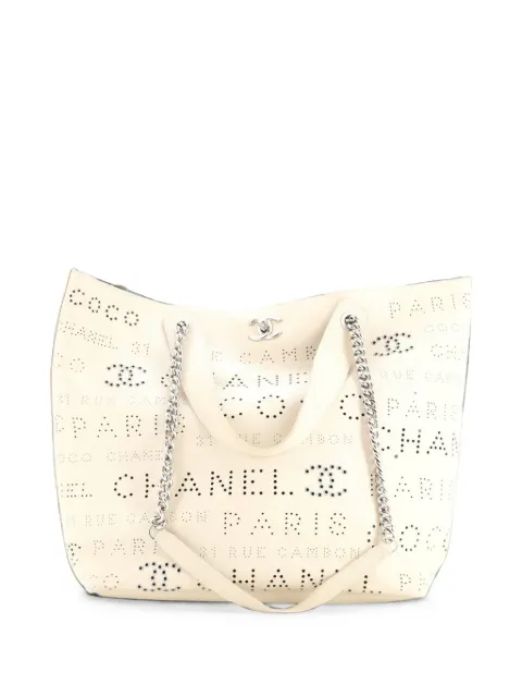 CHANEL Pre-Owned Logo Eyelets Shopping Perforated Calfskin Medium tote bag Neutrals 8JEVP3QWGC3Z75JU