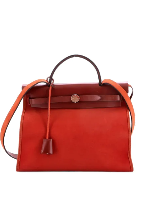 Hermès Pre-Owned Herbag Zip Leather and Toile 31 shoulder bag Red KE1KO99GQXVOX9QJ