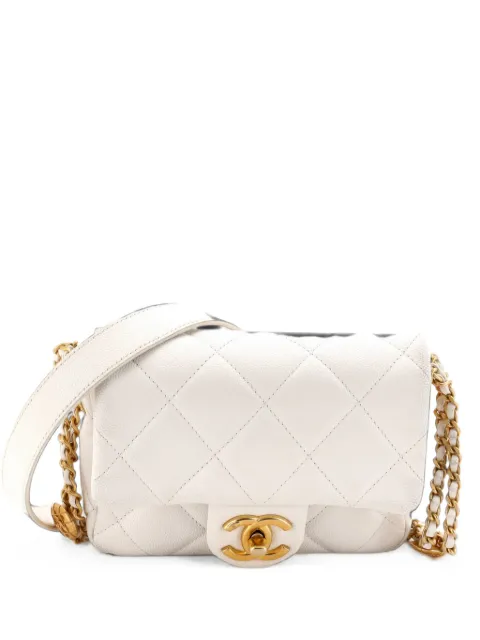 CHANEL Pre-Owned Twist Your Buttons Flap Bag Quilted Caviar Mini crossbody bag White DXCEHLUC2WK9ZCFB