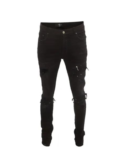 AMIRI MX1 paint-splatter jeans Black 1410447