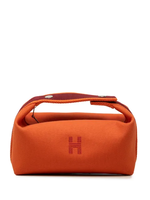 Hermès Pre-Owned 2012-2026 Small Toile Bride A Brac Case vanity bag Orange TN1VD1QH8TZVVYLX