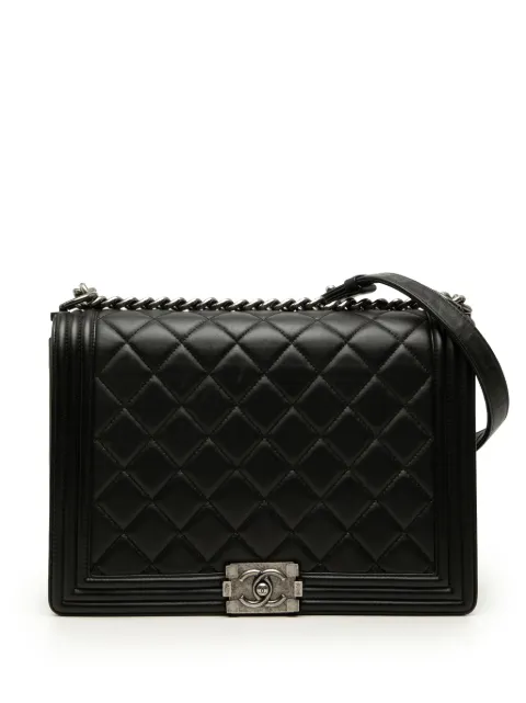 CHANEL Pre-Owned 2014 Large Quilted Lambskin Boy Flap crossbody bag Black OS4LW4CN22YA6KWW