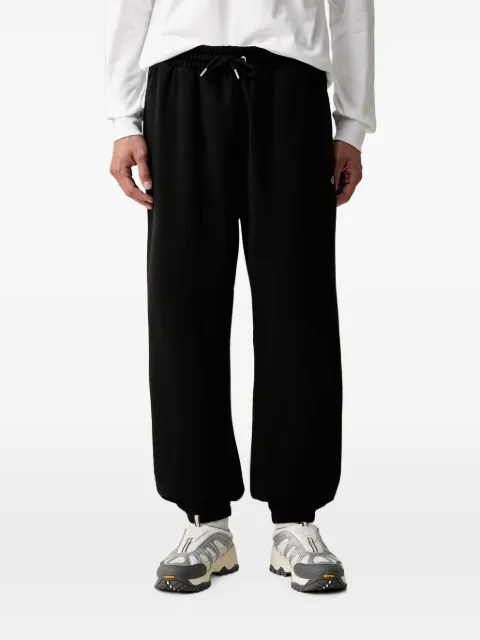 The North Face TNF Essential logo-embroidered track pants Black NF0A8CWC