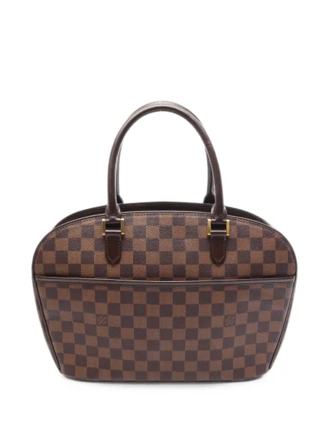 Louis Vuitton Pre-Owned 2002 Saria Horizontal Damier ebene handbag Brown 1099419AR1022