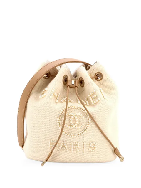 CHANEL Pre-Owned Deauville Drawstring Pearl Embellished Canvas Medium bucket bag Neutrals JZ5EU4E8GR1LK6NW