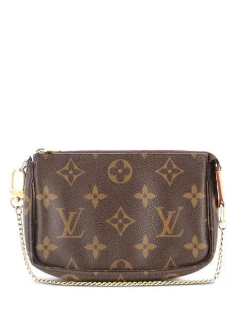 Louis Vuitton Pre-Owned Pochette Accessoires Monogram Canvas Mini clutch bag Brown 6AWBTP9TB8UKZ5N6