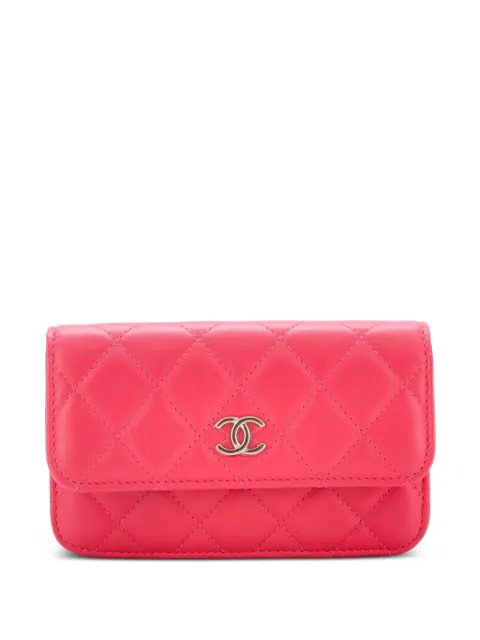 CHANEL Pre-Owned Pearl Strap CC Wallet on Chain Quilted Calfskin Mini crossbody bag Pink B10LKKHKTFEL2RUR
