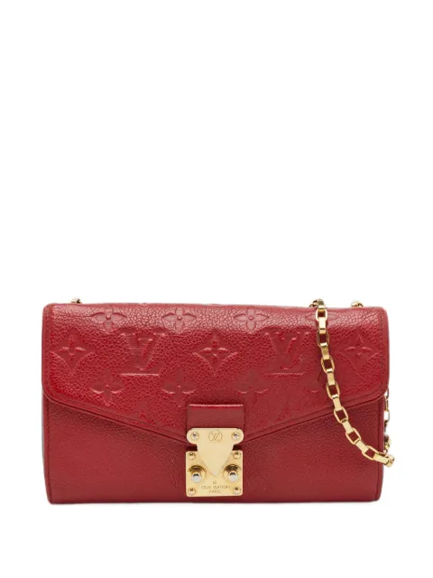 Louis Vuitton Pre-Owned Saint Germain Monogram Empreinte clutch bag Red 1402676