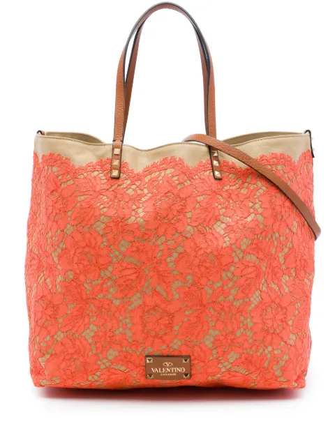 Valentino Garavani Pre-Owned 2018-2026 Canvas Rockstud Glam Lace Reversible Tote satchel Orange EPTCSU5JYU4YGEXY