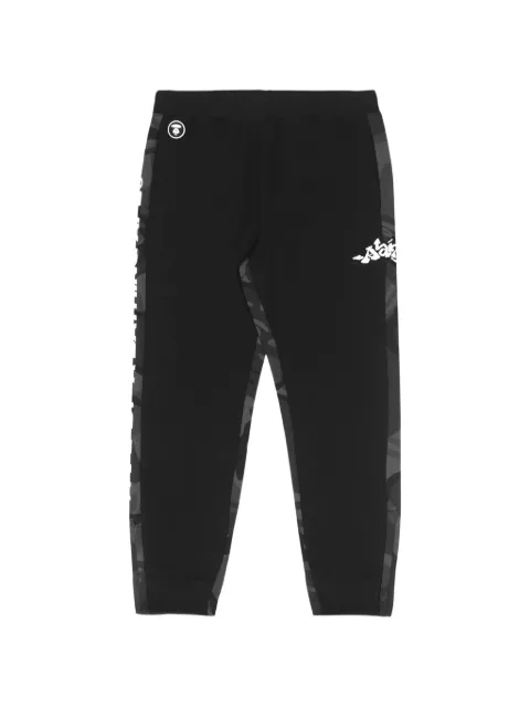 AAPE BY *A BATHING APE® Moonface camouflage-print panelled track pants Black AAPPTM6929XXJ