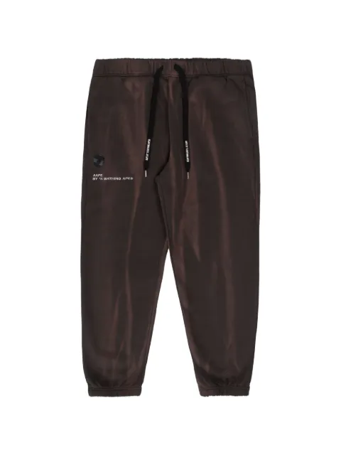 AAPE BY *A BATHING APE® Moonface tie-dye track pants Brown AAPPTM6933XXJ