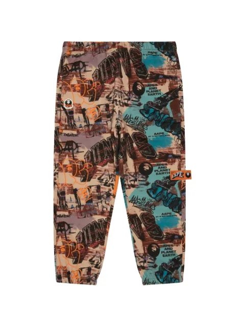 AAPE BY *A BATHING APE® Moonface graffiti track pants Neutrals AAPPTMB640XXN