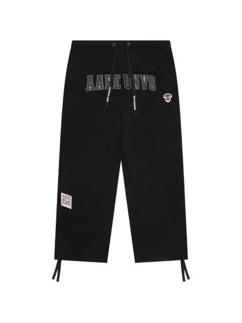 AAPE BY *A BATHING APE® AAPE UNVS logo-patch track pants Black AAPPTMB639XXN
