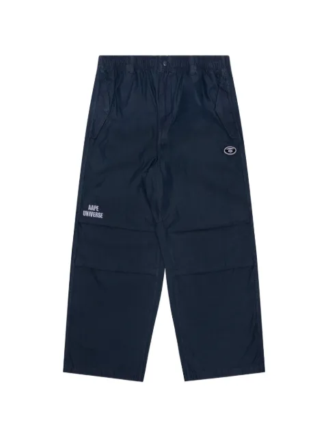 AAPE BY *A BATHING APE® Moonface embroidered track pants Blue AAPPTMA679XXM