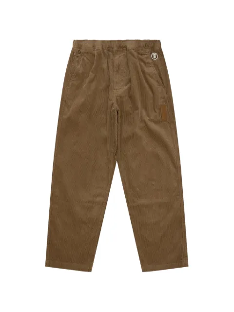 AAPE BY *A BATHING APE® Moonface logo-patch corduroy trousers Brown AAPPTMB620XXN