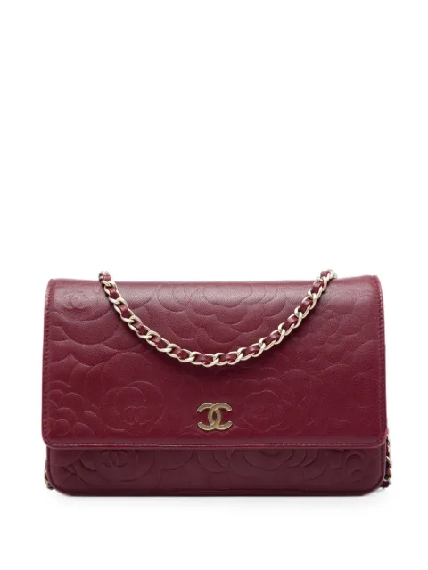 CHANEL Pre-Owned 2012 CC Embossed Calfskin Camellia Wallet On Chain crossbody bag Red EYQFPECOK4C4OFWP