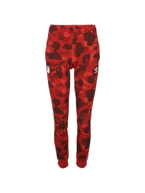 A BATHING APE® x Adidas camouflage-print track pants Red 1129974