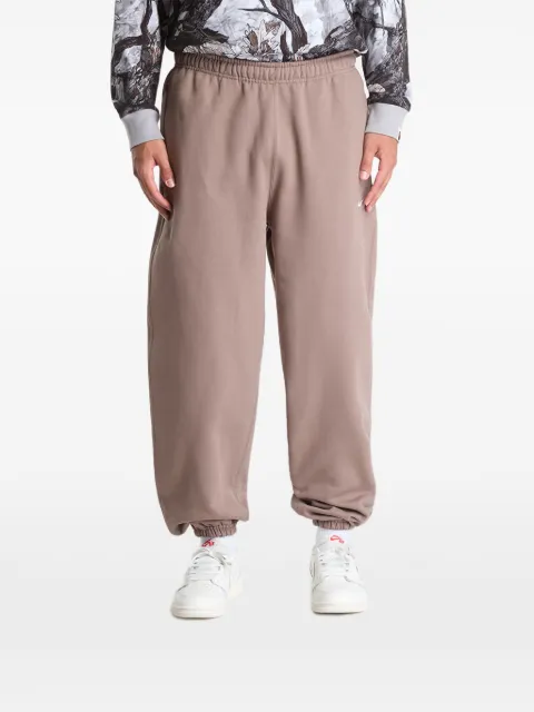 Nike Solo Swoosh embroidered track pants Brown HV1088