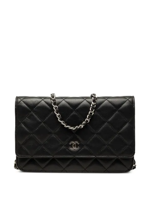 CHANEL Pre-Owned 2014-2015 CC Quilted Lambskin Wallet On Chain crossbody bag Black URR1GTZ3FSYJ9FAI