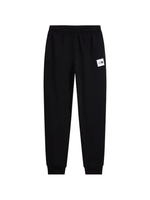 The North Face logo-patch track pants Black NF0A8JB0JK3