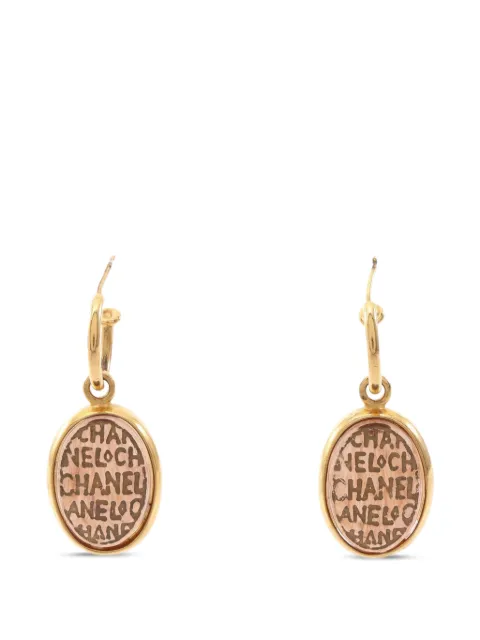 CHANEL Pre-Owned 1999 Gripoix logo earrings Gold 109047199A