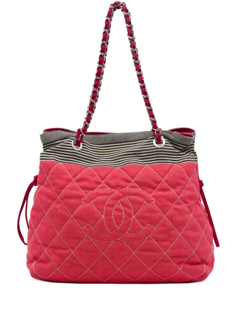 CHANEL Pre-Owned 2009-2010 CC Quilted Denim Grosgrain Drawstring tote bag Red NSMWTRU5LKKAJ8H9