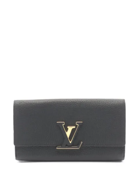 Louis Vuitton Pre-Owned 2018 Capucines bi-fold wallet Black 1096781MI3118