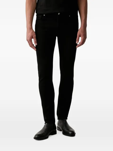 GUESS USA logo-patch slim-fit jeans Black M6YAN1D1486
