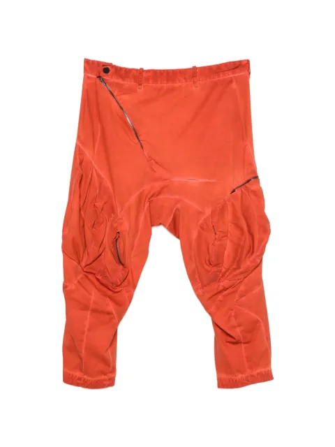 Leon Emanuel Blanck asymmetric-zip panelled trousers Orange DISM45MPP01