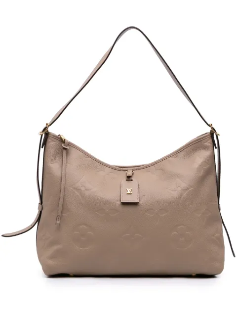 Louis Vuitton Pre-Owned 2021-2026 Monogram Empreinte CarryAll MM crossbody bag Brown K2A7WVJVRID658PM