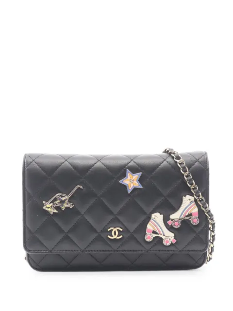 CHANEL Pre-Owned Matelassé charm-details shoulder bag Black 1093971JPT58C4J