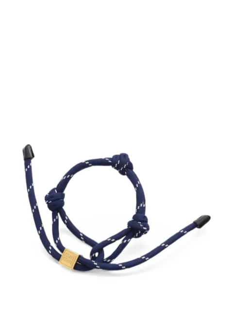 Miu Miu Pre-Owned 2010s logo-plaque cord bracelet Gold 1081516