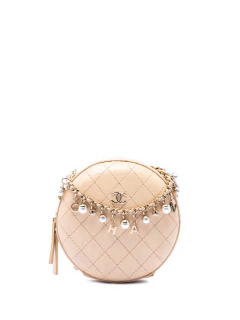 CHANEL Pre-Owned 2019 Stitched Calfskin Logo Strass and Pearl Chain Round crossbody bag Neutrals 7VWIS63SH469POEY