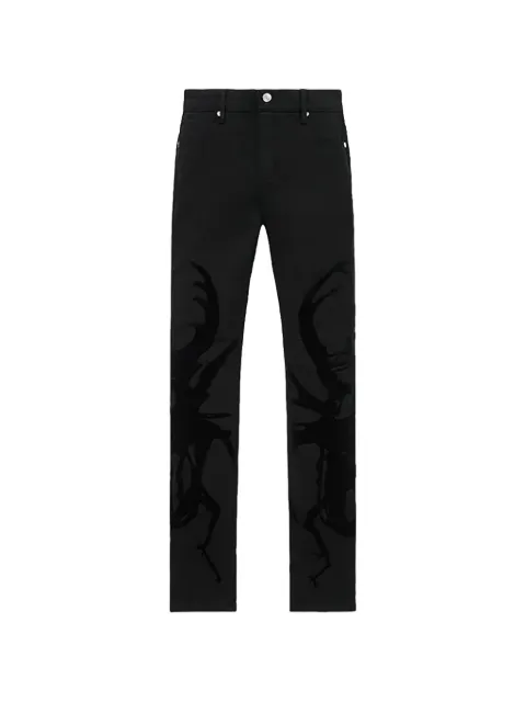 RTA Bryant beetle-print jeans Black MCHPD1302J1205BCKBT