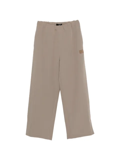 AMIRI elasticated-waistband logo-patch trousers Neutrals AMBMPA1086