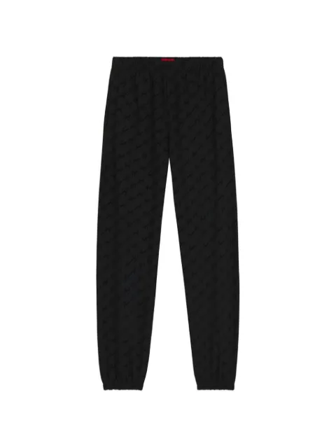 HUGO Flokky relaxed-fit tracksuit bottoms with flocked-logo print Black 50566682