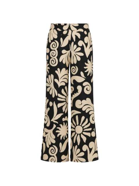 Cala de la Cruz Toya floral-print trousers Black 25D511