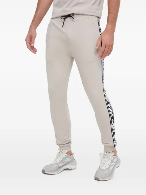 GUESS USA logo-tape track pants Neutrals Z2YB19K6ZS1