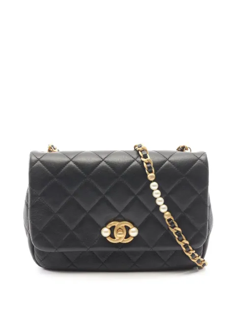 CHANEL Pre-Owned 2021-2026 Quilted Lambskin Pearl Side Flap crossbody bag Black ANE0599SU7AEKR8J