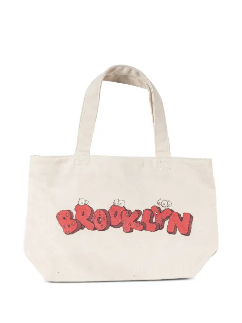 KAWS mini Brooklyn graphic-print tote bag Neutrals KAWS202540