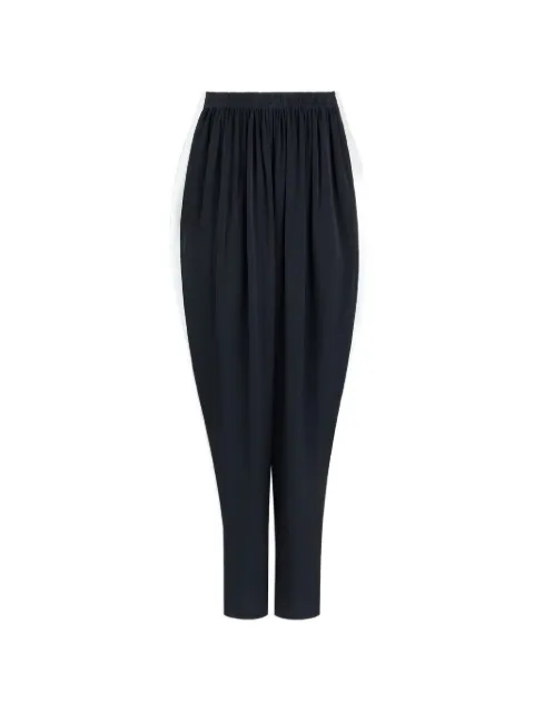 Alaïa Cady satin-finish gathered trousers Black AA9P1398W201D