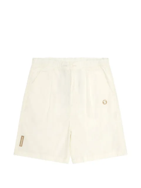AAPE BY *A BATHING APE® logo-patch pleated shorts Neutrals AAPSPMB670XXO